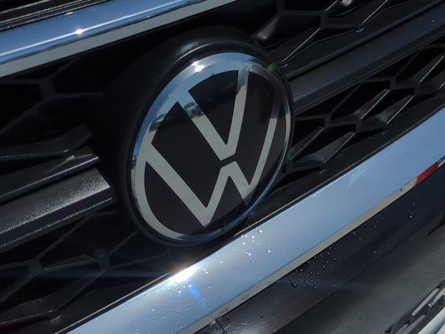 used 2024 Volkswagen Taos car, priced at $22,999