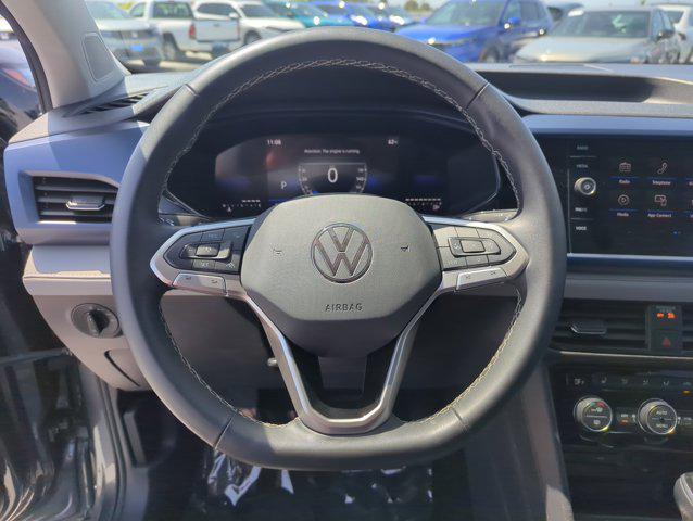 used 2024 Volkswagen Taos car, priced at $22,999