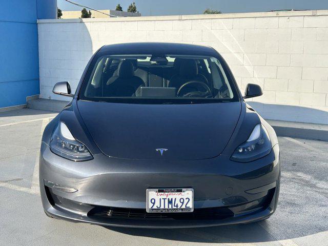 used 2023 Tesla Model 3 car, priced at $26,498