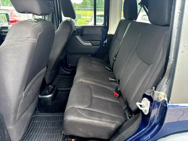 used 2013 Jeep Wrangler Unlimited car, priced at $12,995