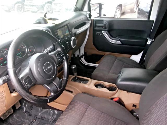 used 2011 Jeep Wrangler Unlimited car, priced at $12,995