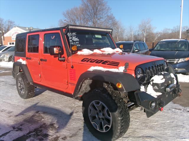 used 2015 Jeep Wrangler Unlimited car, priced at $13,495