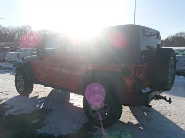 used 2015 Jeep Wrangler Unlimited car, priced at $13,495