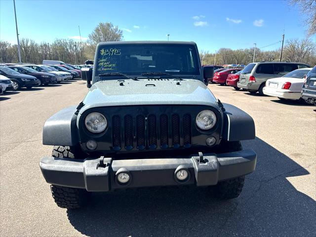 used 2014 Jeep Wrangler car, priced at $13,995