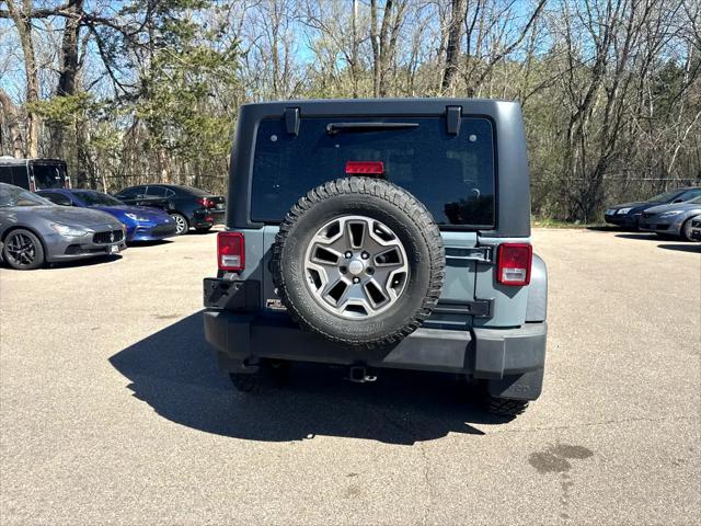 used 2014 Jeep Wrangler car, priced at $13,995