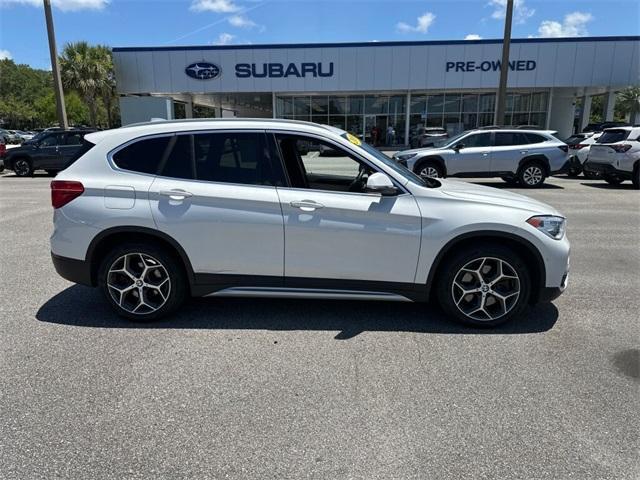 used 2019 BMW X1 car, priced at $14,000