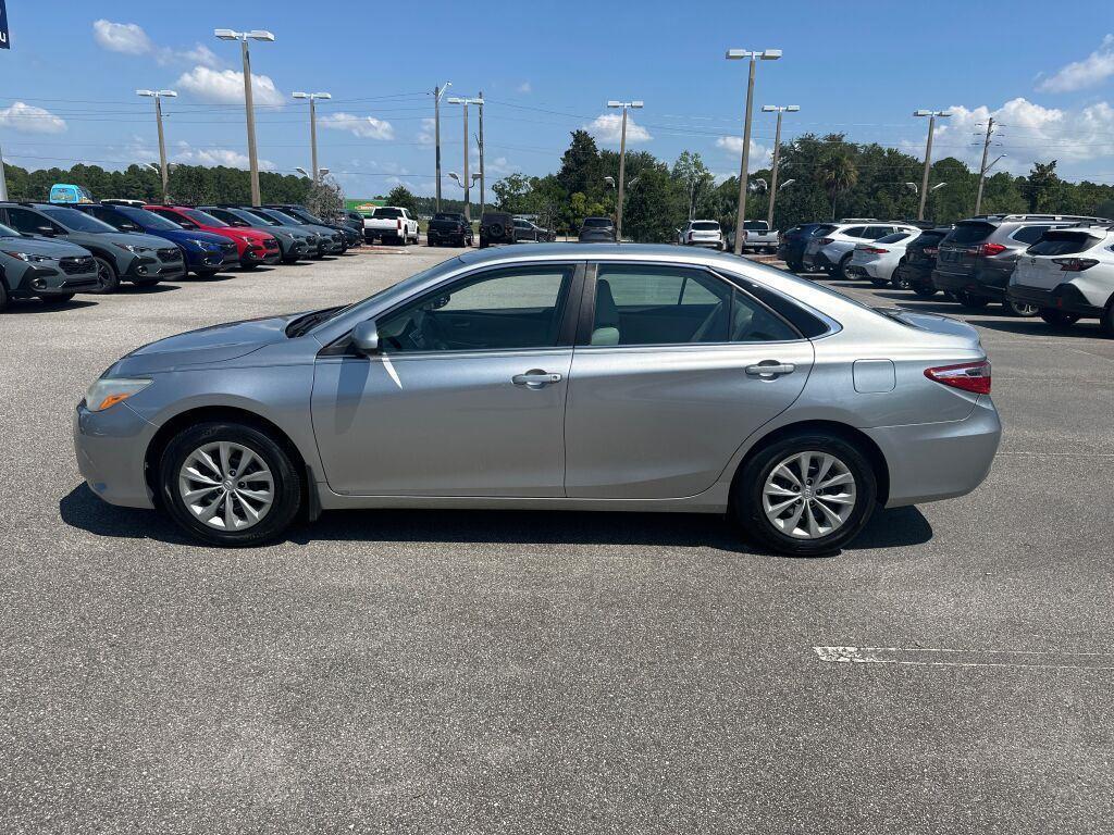used 2015 Toyota Camry car, priced at $12,000