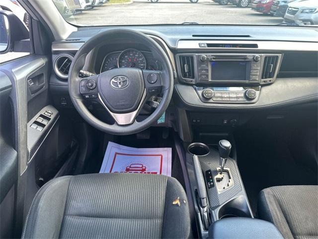 used 2013 Toyota RAV4 car, priced at $14,000