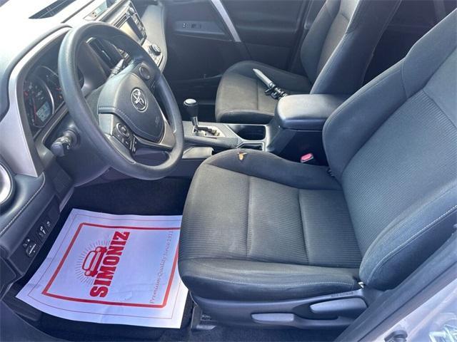used 2013 Toyota RAV4 car, priced at $14,000