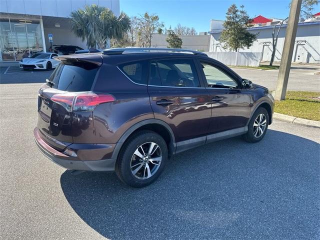 used 2017 Toyota RAV4 car, priced at $13,000