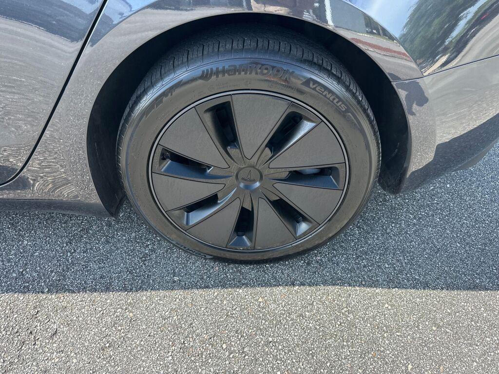 used 2024 Tesla Model 3 car, priced at $34,000