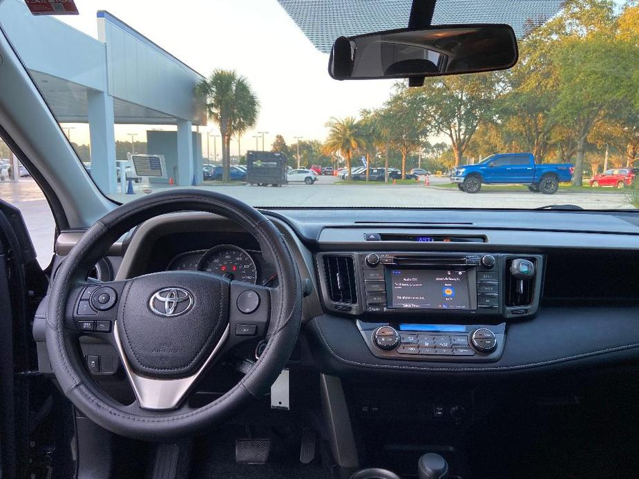 used 2014 Toyota RAV4 car, priced at $15,000