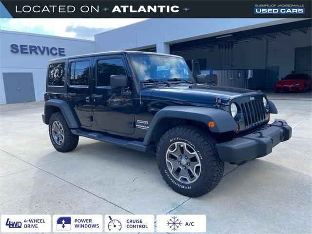 used 2013 Jeep Wrangler Unlimited car, priced at $15,500