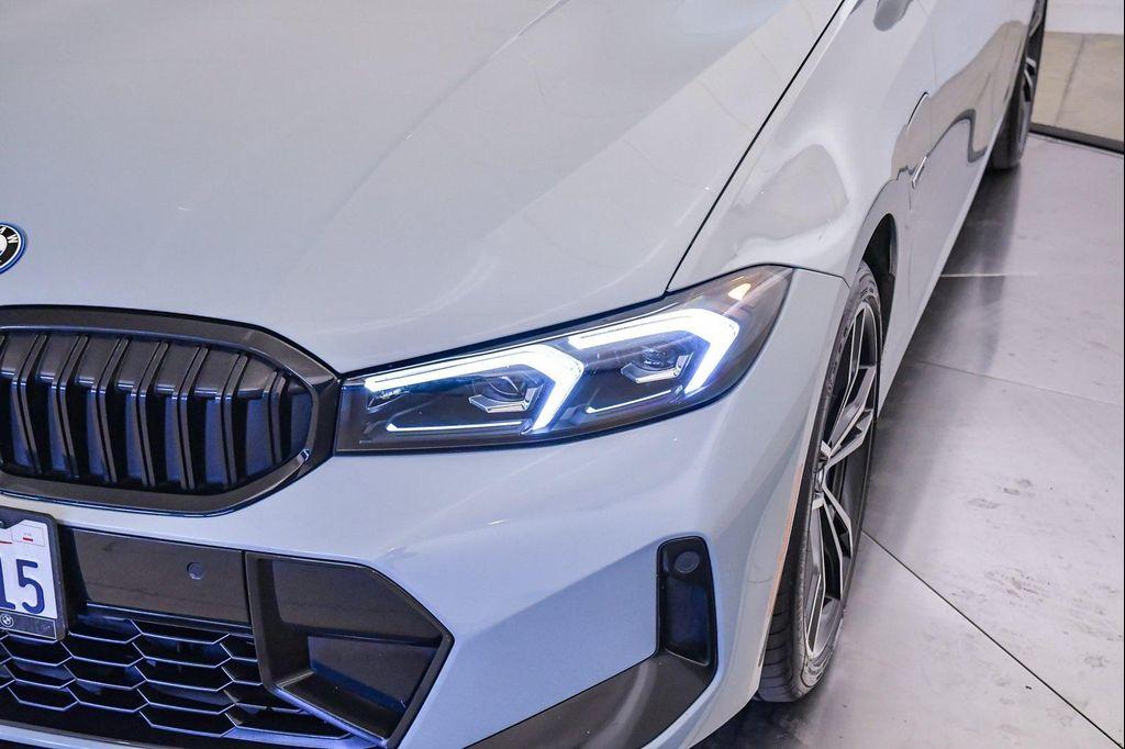 used 2023 BMW 330e car, priced at $32,928