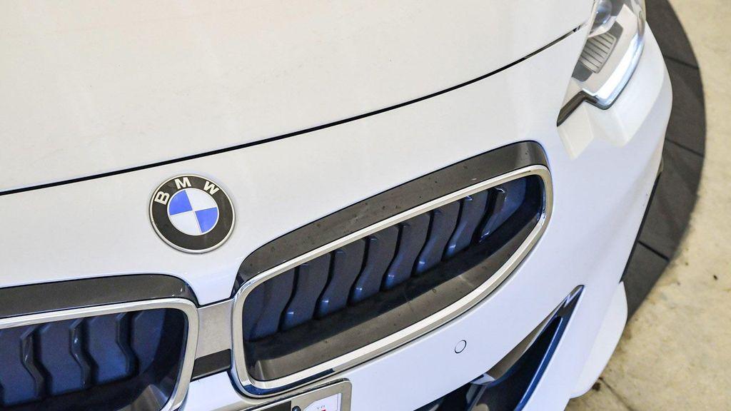 used 2023 BMW 230 car, priced at $31,099
