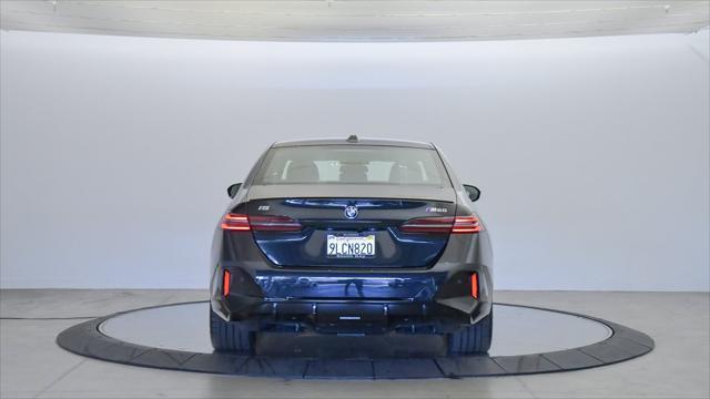 used 2024 BMW i5 car, priced at $93,395