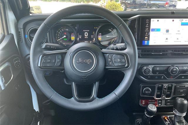used 2024 Jeep Wrangler 4xe car, priced at $38,900