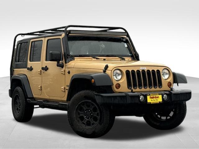 used 2013 Jeep Wrangler Unlimited car, priced at $15,990