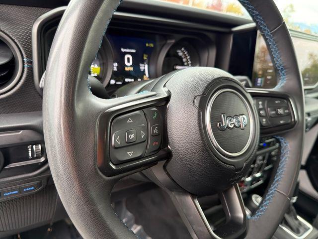 used 2024 Jeep Wrangler 4xe car, priced at $30,290