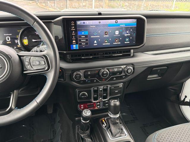 used 2024 Jeep Wrangler 4xe car, priced at $30,290