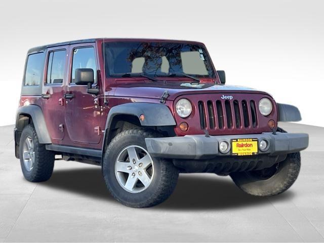used 2011 Jeep Wrangler Unlimited car, priced at $14,990