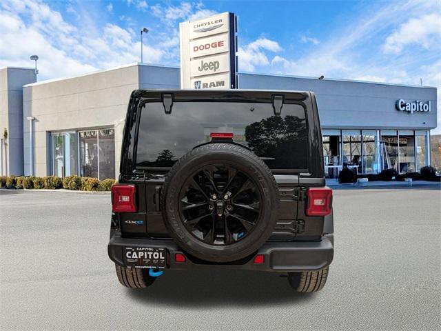 used 2022 Jeep Wrangler Unlimited 4xe car, priced at $26,468