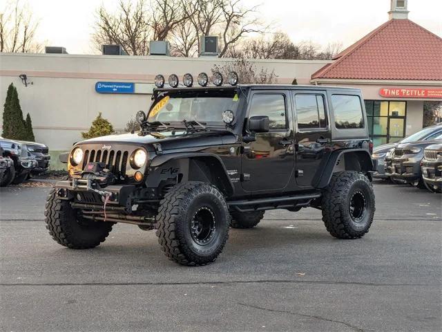 used 2015 Jeep Wrangler Unlimited car, priced at $17,489