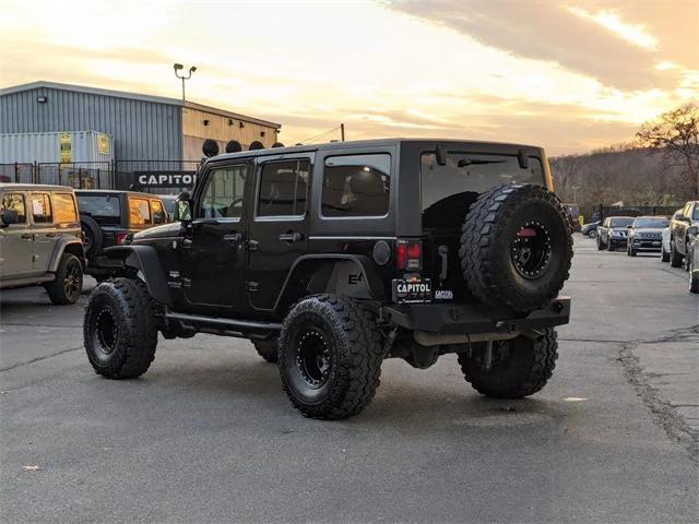 used 2015 Jeep Wrangler Unlimited car, priced at $17,489