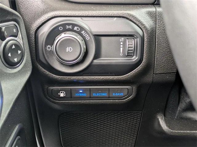 used 2023 Jeep Wrangler 4xe car, priced at $31,273