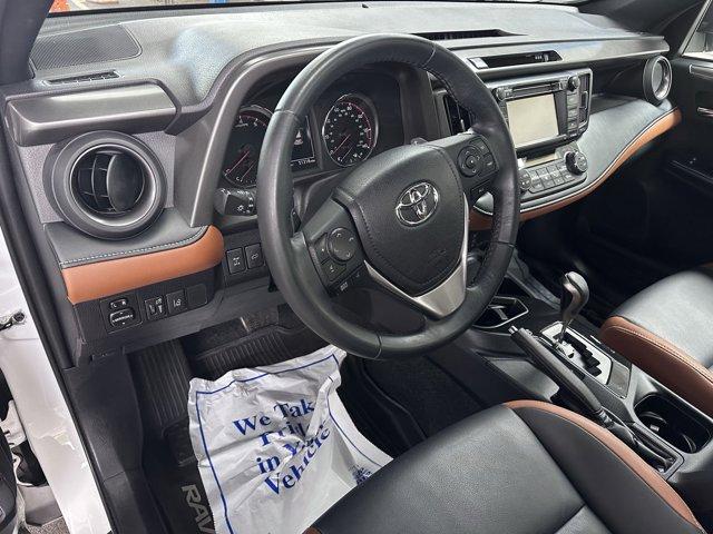 used 2018 Toyota RAV4 car, priced at $23,588