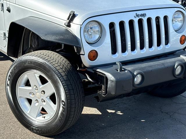 used 2010 Jeep Wrangler Unlimited car, priced at $12,990