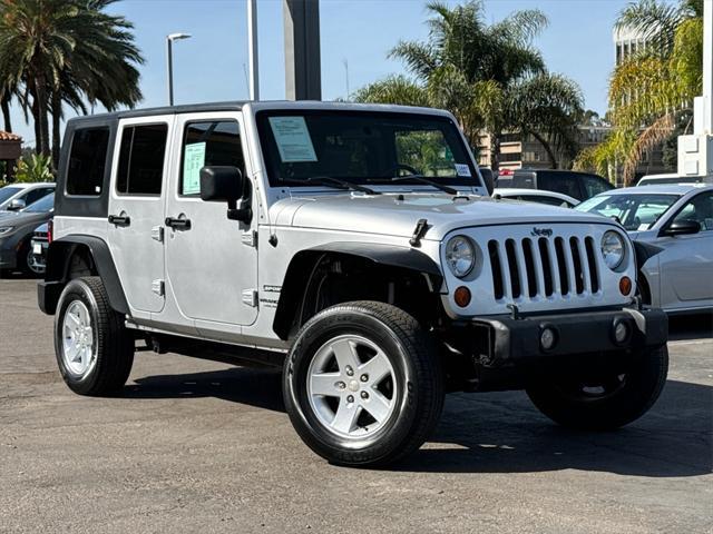 used 2010 Jeep Wrangler Unlimited car, priced at $12,990