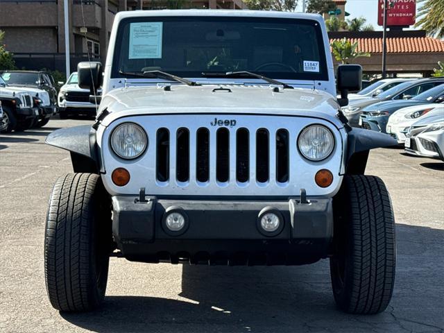 used 2010 Jeep Wrangler Unlimited car, priced at $12,990