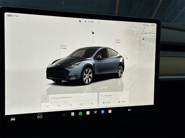 used 2024 Tesla Model Y car, priced at $33,989