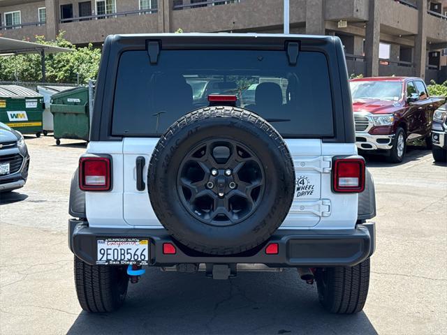 used 2023 Jeep Wrangler 4xe car, priced at $27,747
