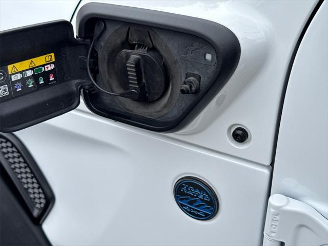 used 2023 Jeep Wrangler 4xe car, priced at $31,714