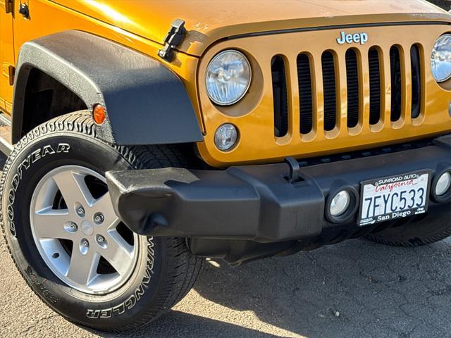 used 2014 Jeep Wrangler car, priced at $17,997