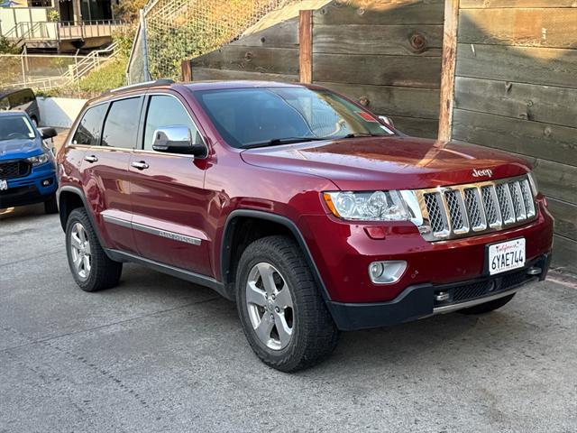 used 2013 Jeep Grand Cherokee car, priced at $12,888