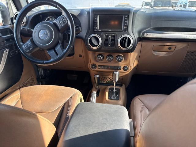 used 2015 Jeep Wrangler Unlimited car, priced at $19,729