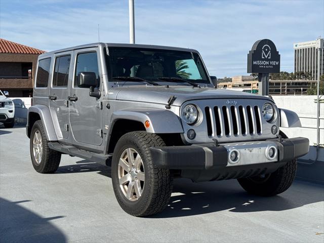 used 2015 Jeep Wrangler Unlimited car, priced at $19,729