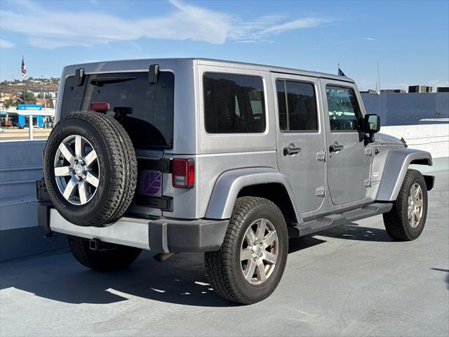 used 2015 Jeep Wrangler Unlimited car, priced at $19,729