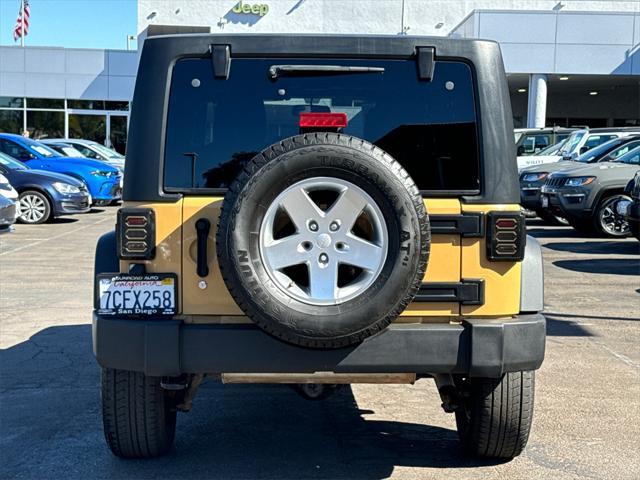 used 2013 Jeep Wrangler Unlimited car, priced at $16,568