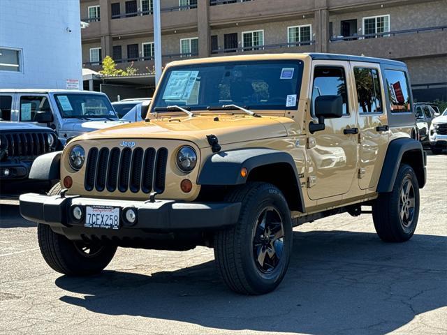 used 2013 Jeep Wrangler Unlimited car, priced at $16,568