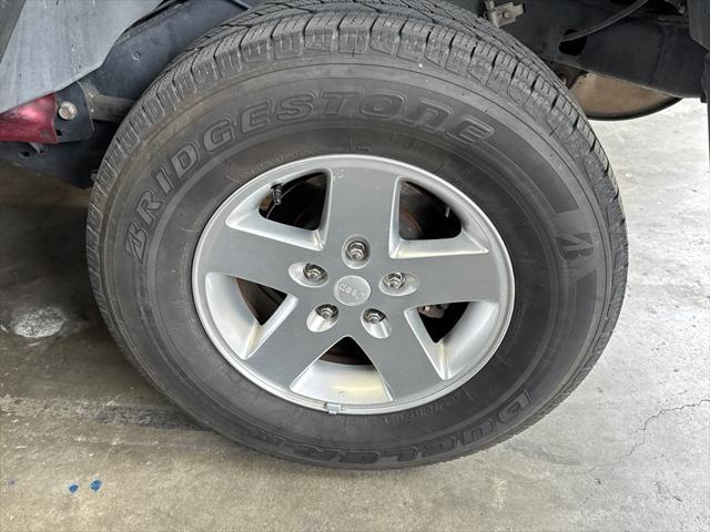 used 2013 Jeep Wrangler Unlimited car, priced at $15,983