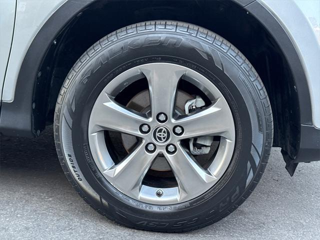 used 2015 Toyota RAV4 car, priced at $15,000