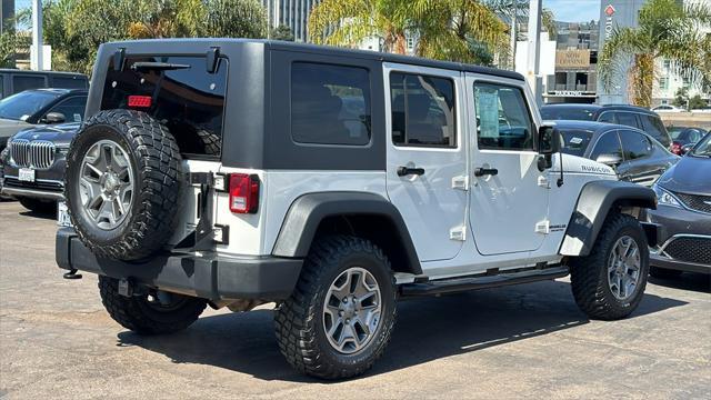 used 2010 Jeep Wrangler Unlimited car, priced at $15,869