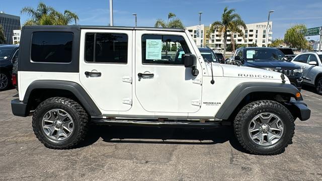 used 2010 Jeep Wrangler Unlimited car, priced at $15,869