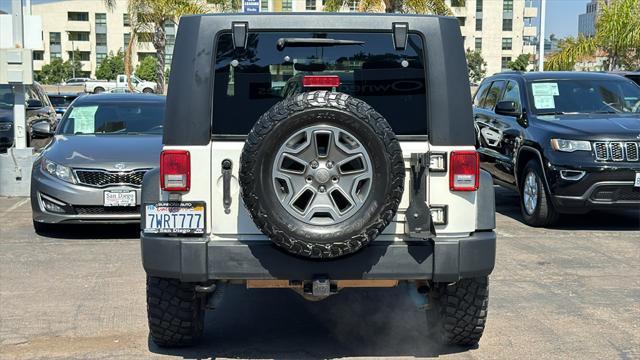 used 2010 Jeep Wrangler Unlimited car, priced at $15,869