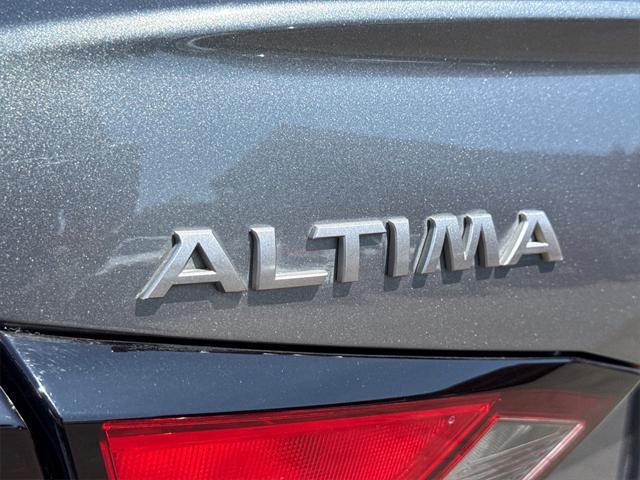 used 2023 Nissan Altima car, priced at $15,555