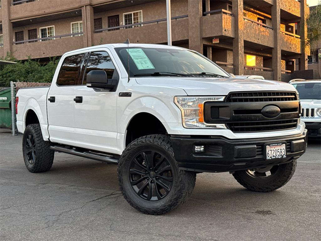 used 2019 Ford F-150 car, priced at $23,442